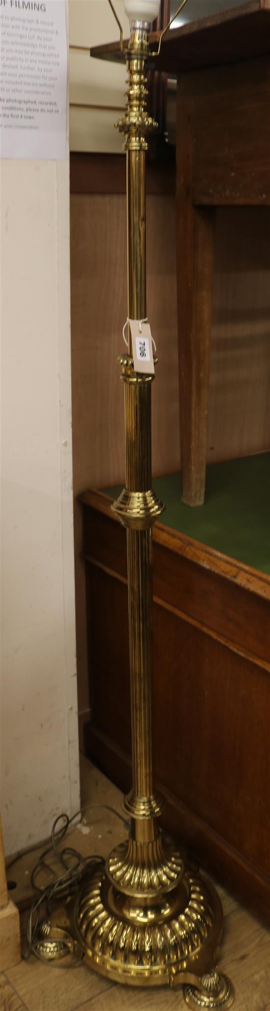 A Victorian brass standard lamp (converted) and shade, 170cm high